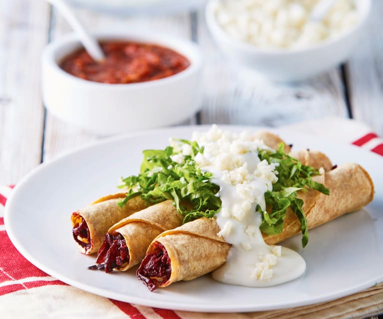 tacos dorados del dia del taco